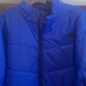 Blue North Face Jacket. Brand New